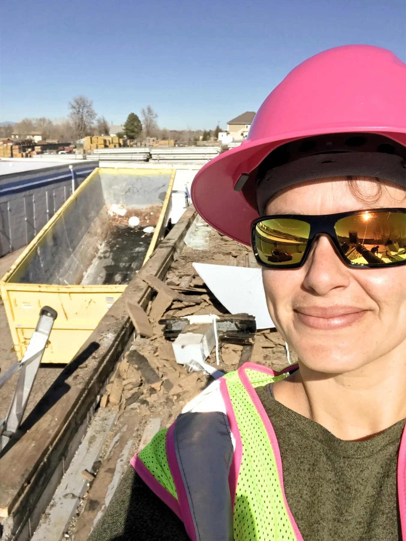 Alex Crawfurd completing a hands-on roof assessment in Colorado